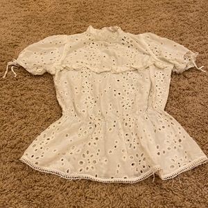 Reformation eyelet top